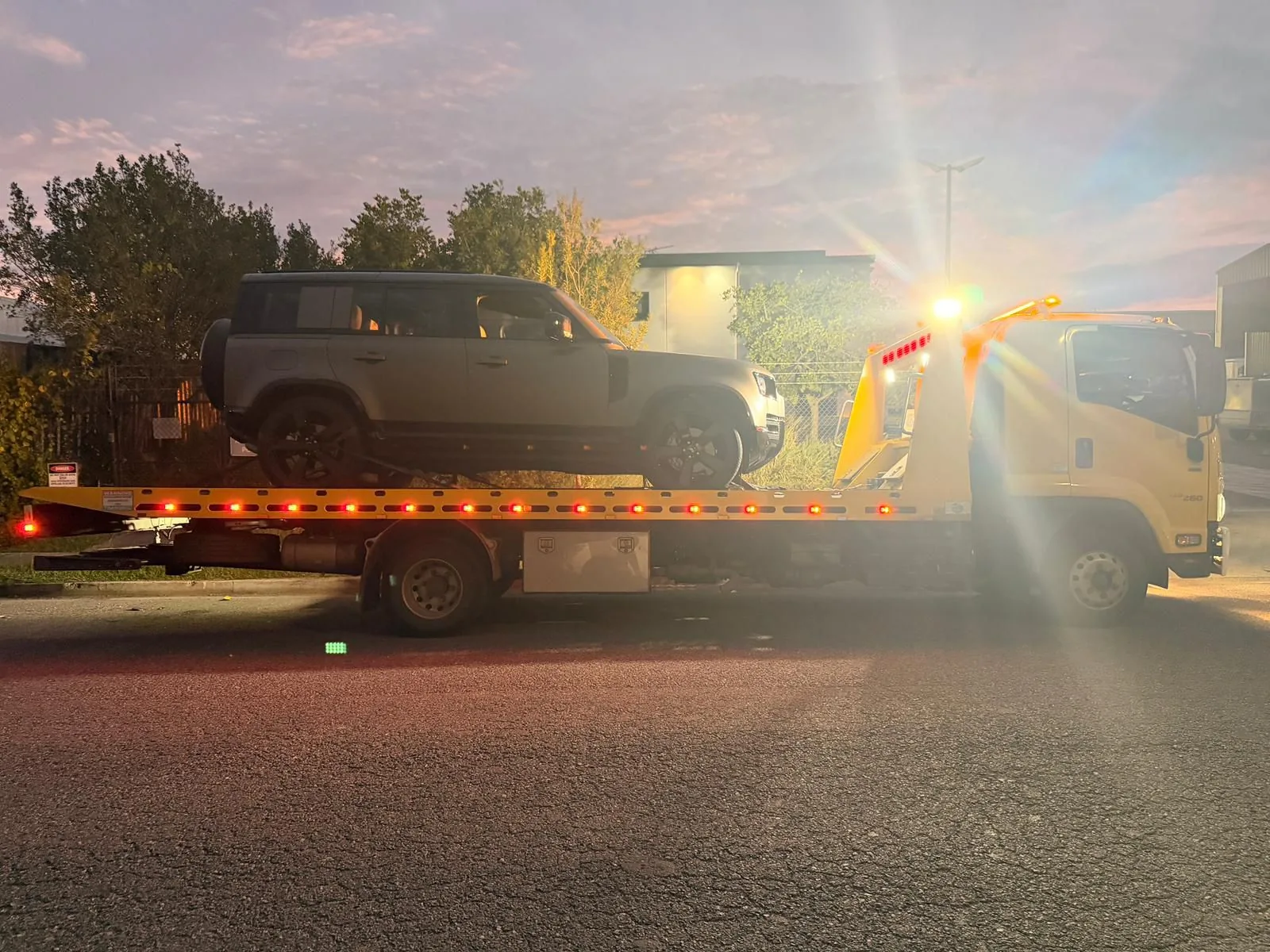 TowFast Brisbane after hours tow truck service with a vehicle secured on the tilt tray