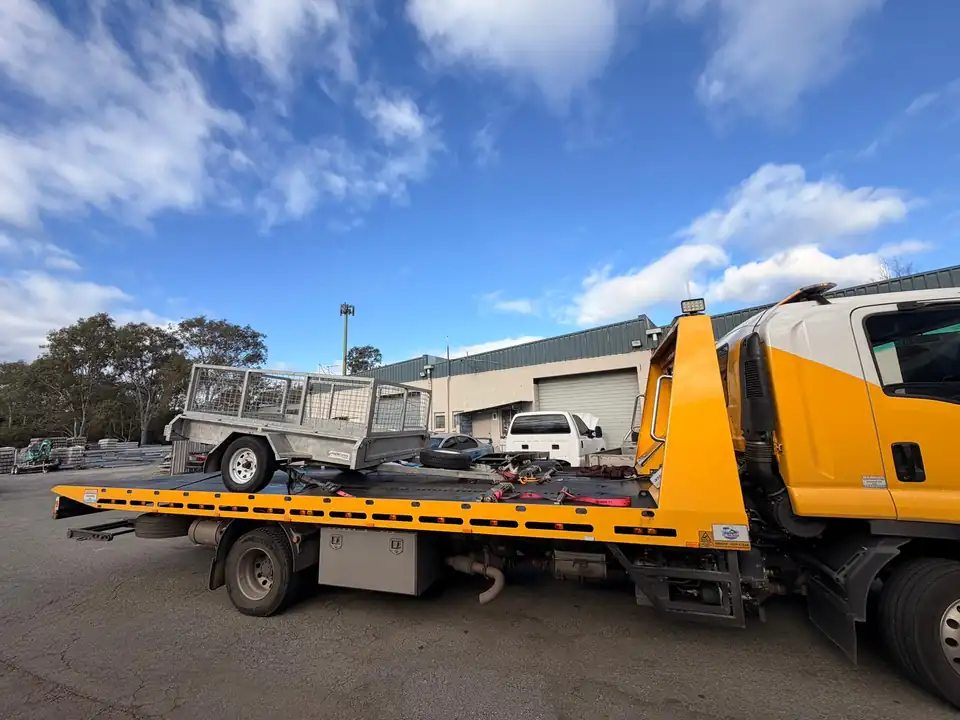Cage trailer transported on a TowFast Brisbane tilt tray